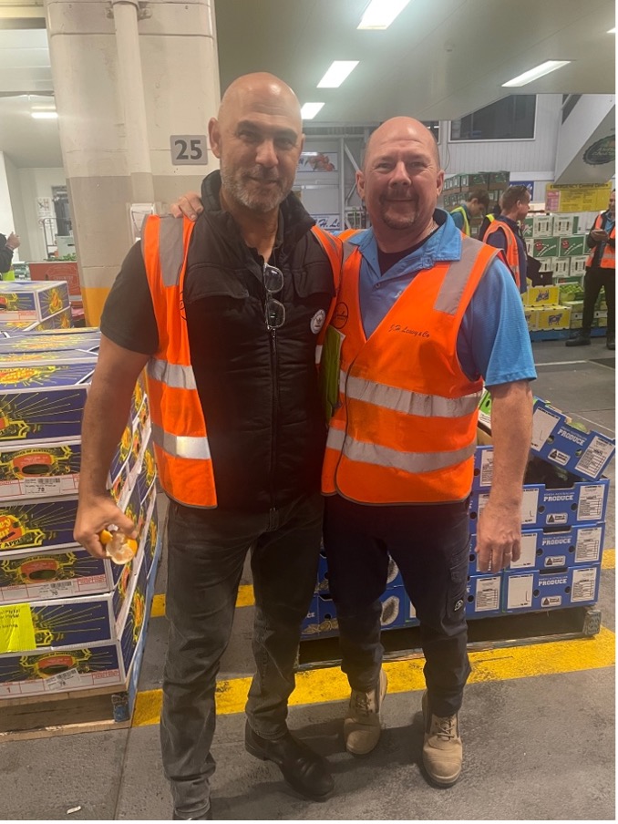 Samuel Nicolaou (left) and Christopher Mizzen (right) in the Brisbane Produce Market.